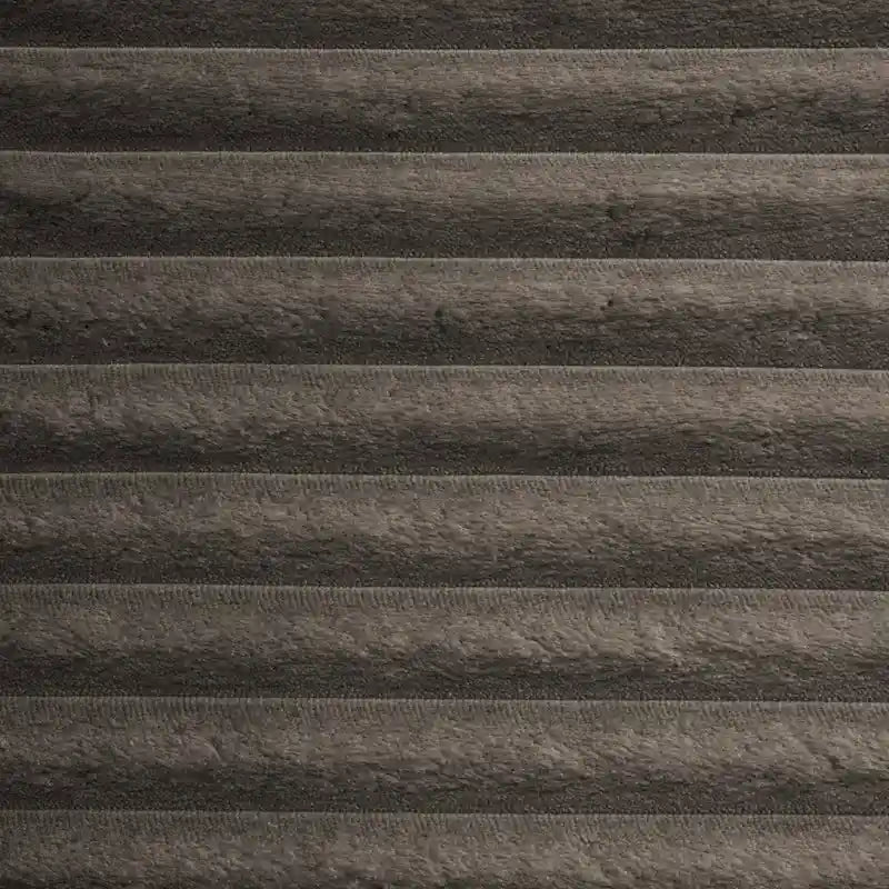 Fauteuil pivotant rond à accoudoirs encastrés et housse amovible en fausse fourrure