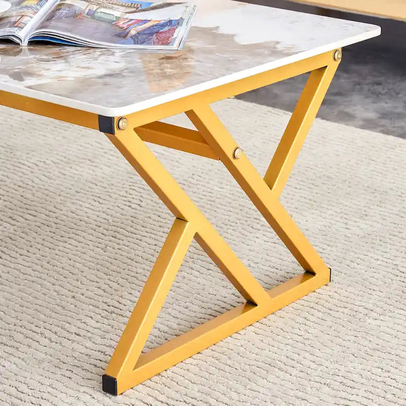 Table basse rectangulaire moderne de 120 cm avec plateau en pierre frittée et pieds en métal en forme de X